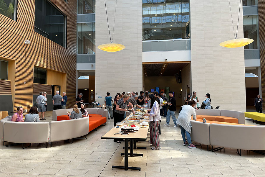 people having food and drinks in a large space