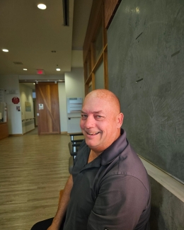 Stem cell recipient sitting and looking at camera