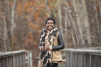 Revée Agyepong smiling and standing outdoors