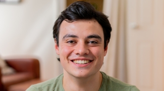 Image of Stem cell donor Robbie Faraday smiling in front of the camera