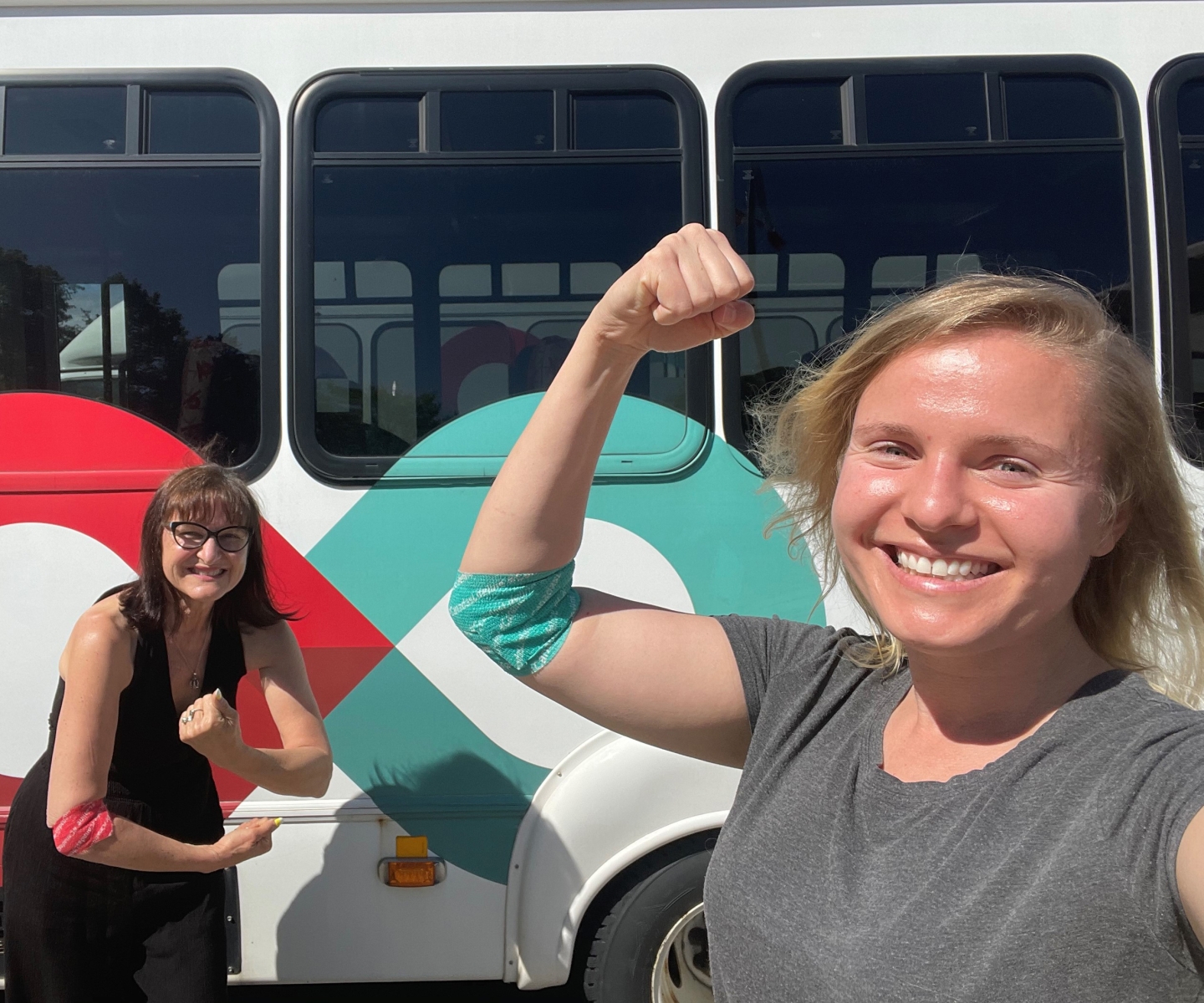 Blood donors showing off pressure bandages