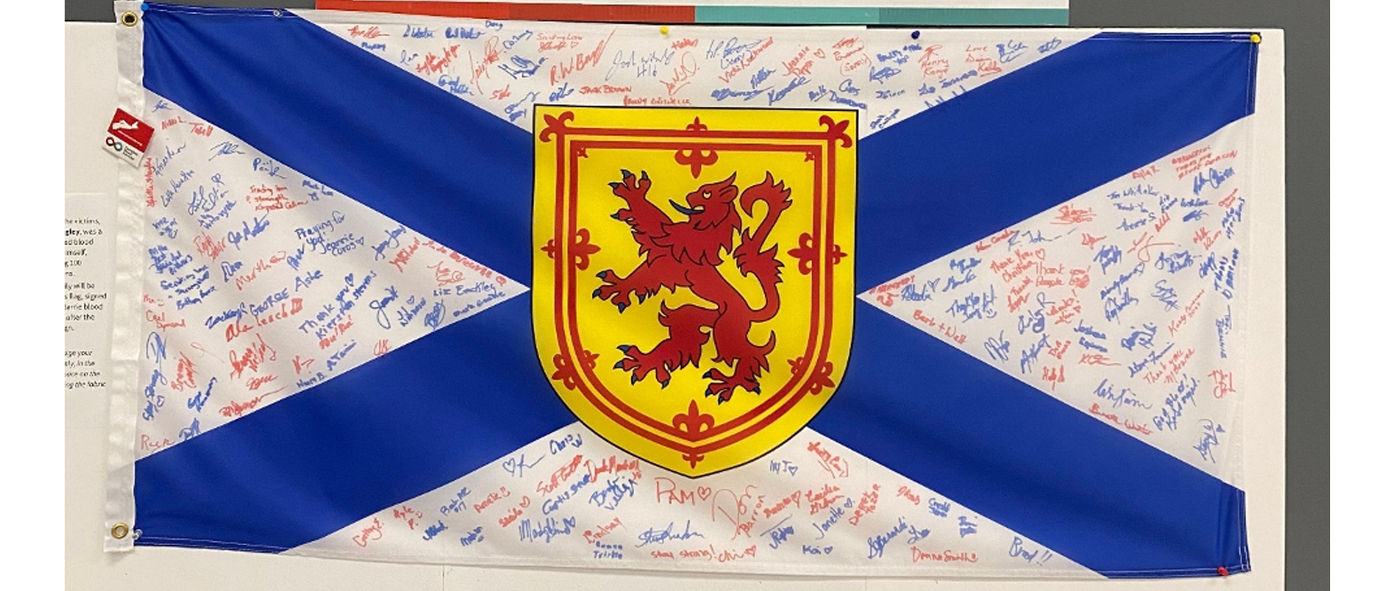 Nova Scotia flag with signatures on it