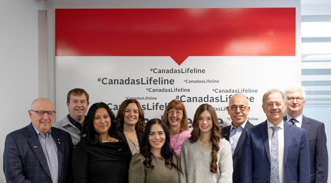 2024 National Award recipients standing together with CBS executives, in front of a backdrop that says #CanadasLifeline