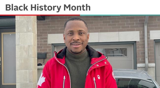 Akintunde Adeniyi, a Black employee at Canadian Blood Services, stands in front of his bricked house. Akintunde wants to see his organization’s diversity and inclusion work continue in 2021 with the same momentum it did last year.