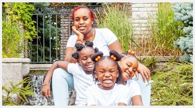 Jamaique Rose poses with her three daughters. Jamaique urgently needs a stem cell transplant. She urges Black Canadians to join the stem cell registry.