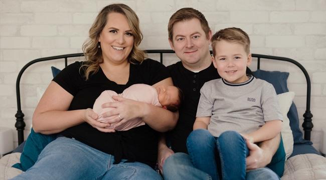 Cord blood donor Kelsey Koch and her family with their newborn baby.
