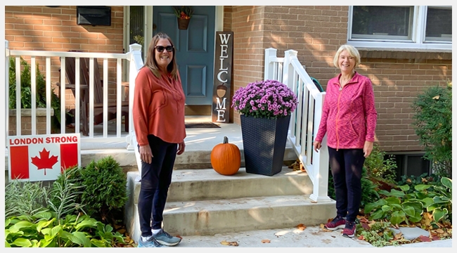 Thumbnail image of Lissa Regan and Judy Howard standing outside of a home.